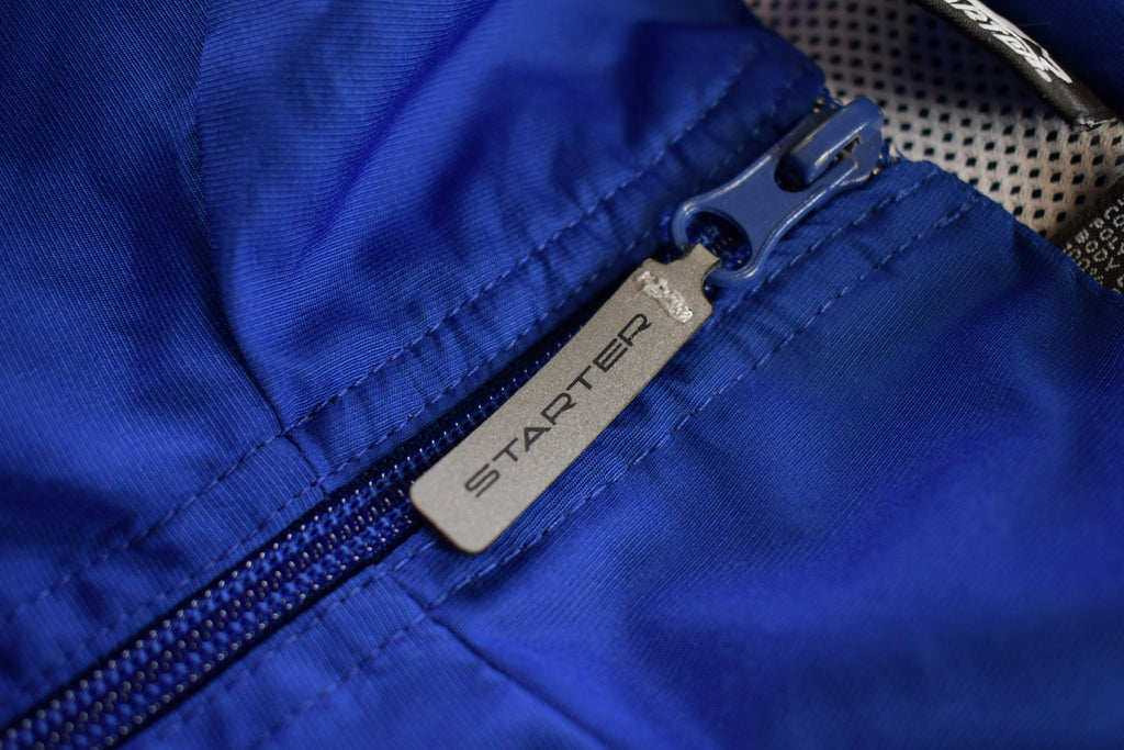 Vintage 1990s Starter Embroidered Windbreaker Jacket