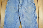 Vintage 1990s Carhartt Distressed Double Knee Denim Work Jeans Adult 34 x 30