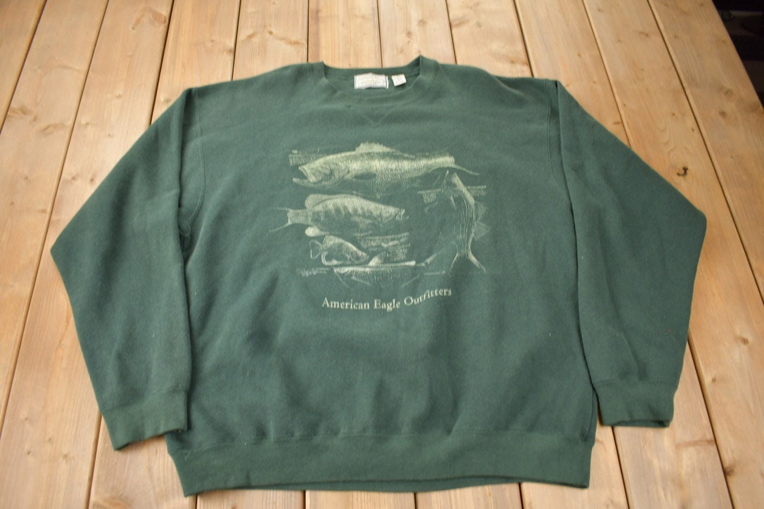 Vintage 1990s American Eagle Outfitters Fish Graphic Outdoorsman Crewneck Sweatshirt Size XL