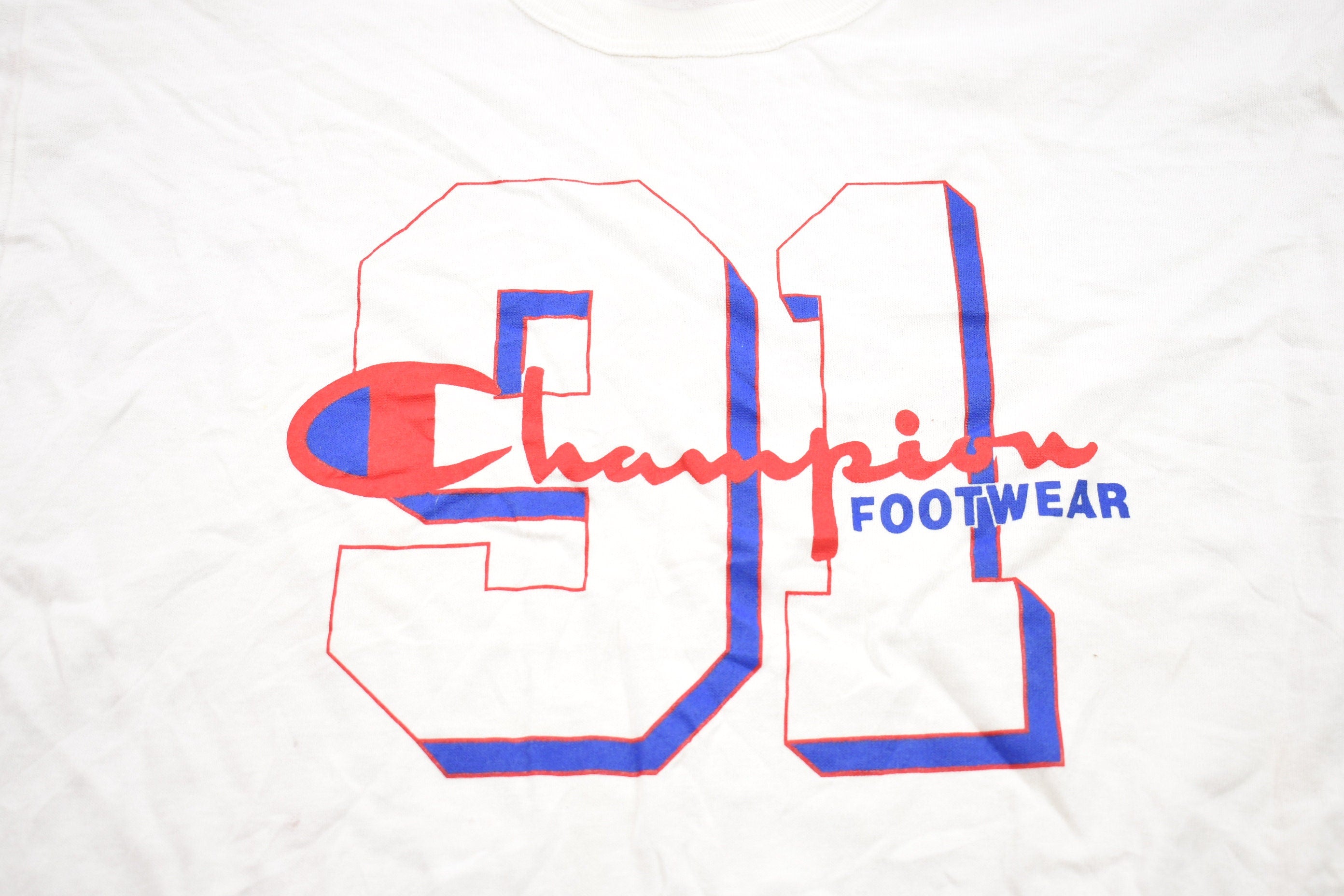 Vintage 1990s Champion Footwear Graphic T-Shirt