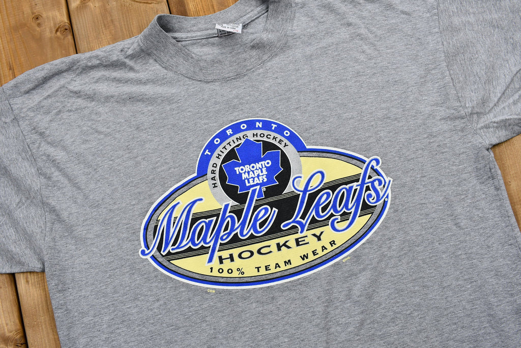 Vintage 1990s Toronto Maple Leafs T-Shirt  NHL  Hard Hitting Hockey  90s Streetwear  Athleisure  Sportswear