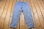Vintage 1990s Levi's 550 Red Tab Jeans Size 32 x 30
