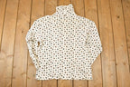 Vintage 1990s The Woolrich Woman AOP Floral Graphic Print Turtleneck Shirt Womens L  90's Destination Shirt
