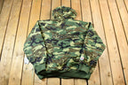 Vintage 1990s Camo Pittsburgh Steelers NFL Football Hooded Puffer Jacket