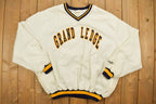 Vintage 1990s DeLong Grand Ledge Pullover Jacket  Team Logo  Athletic Sportswear  Streetwear  Athletic  Made In USA  V-Neck