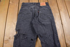 Vintage 1990s Levi's Distressed 550 Red Tab Jeans Size 30 x 32