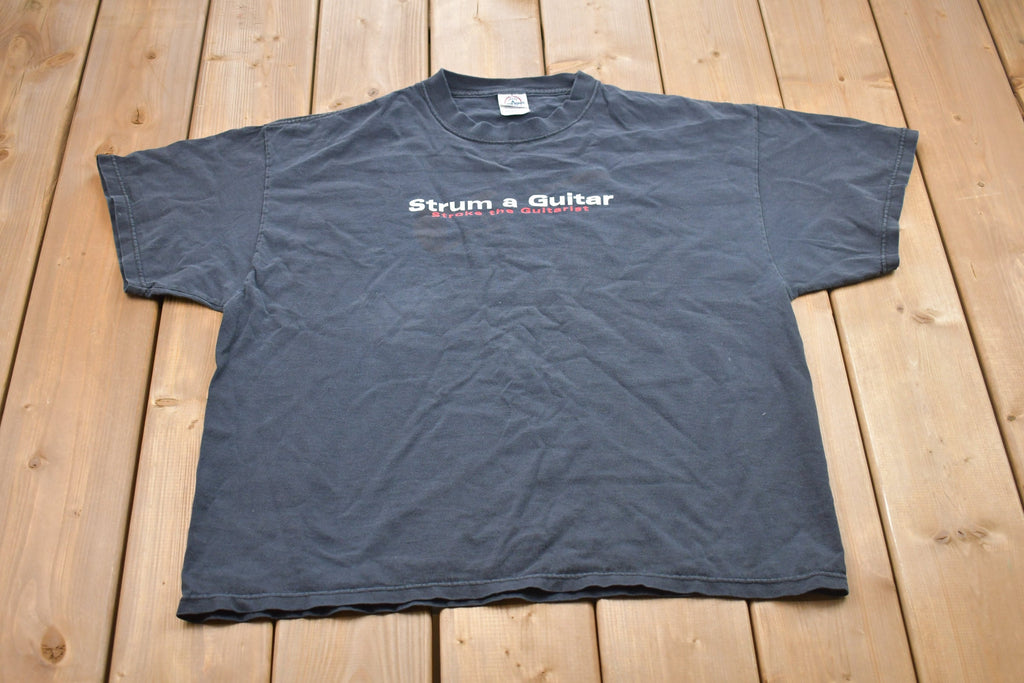 Vintage 1990s Strum A Guitar Funny Graphic T-Shirt