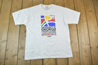 Vintage 2001 Okoboji Cycling Classic Souvenir Single Stitch Graphic Print T-Shirt