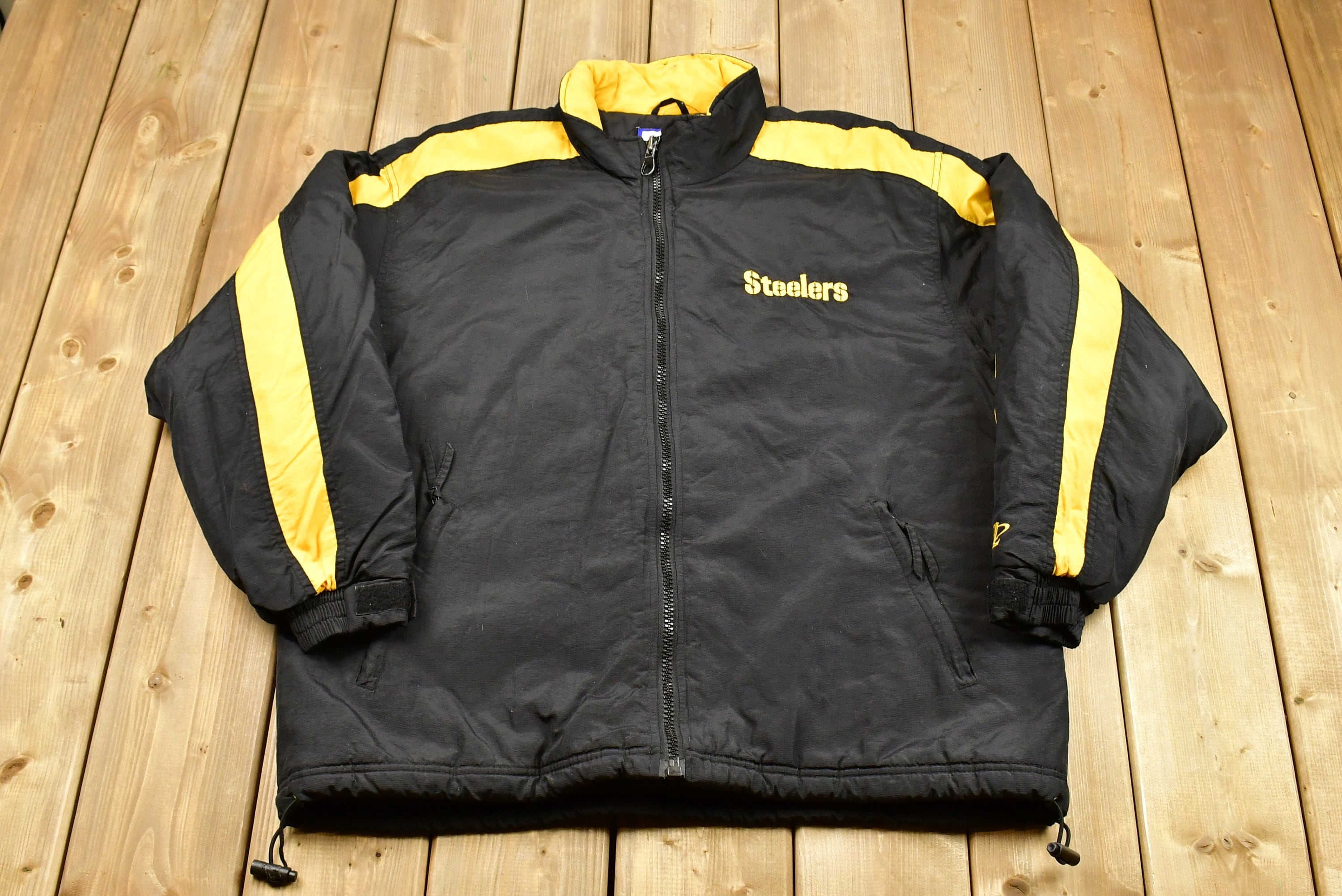 Vintage 1990s Pittsburgh Steelers NFL Logo Athletic Puffer Jacket