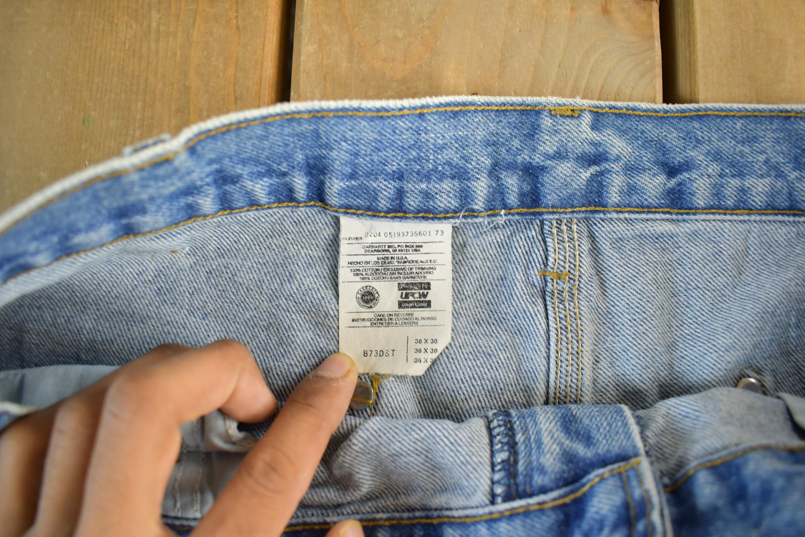 Vintage 1990s Carhartt Distressed Double Knee Denim Work Jeans Adult 34 x 30