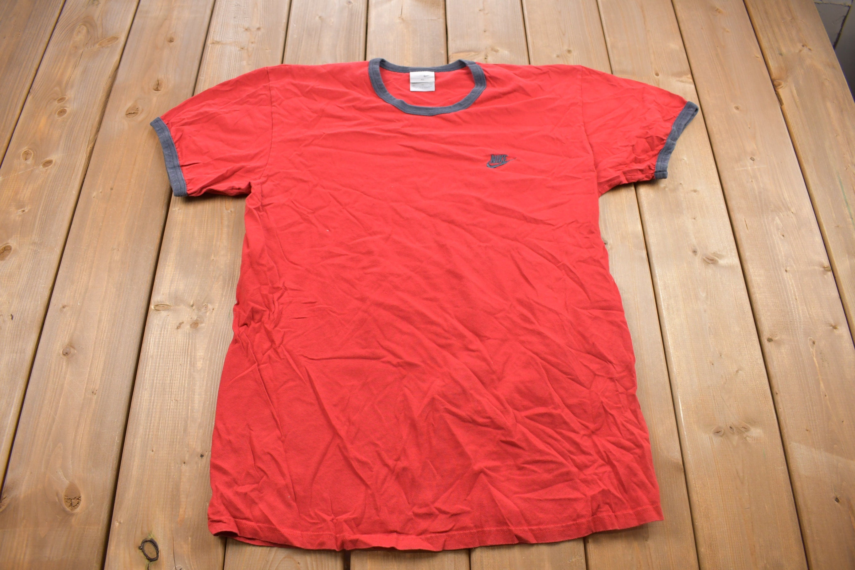 Vintage 1990s Nike Small Logo Graphic Ribbed Neck T Shirt