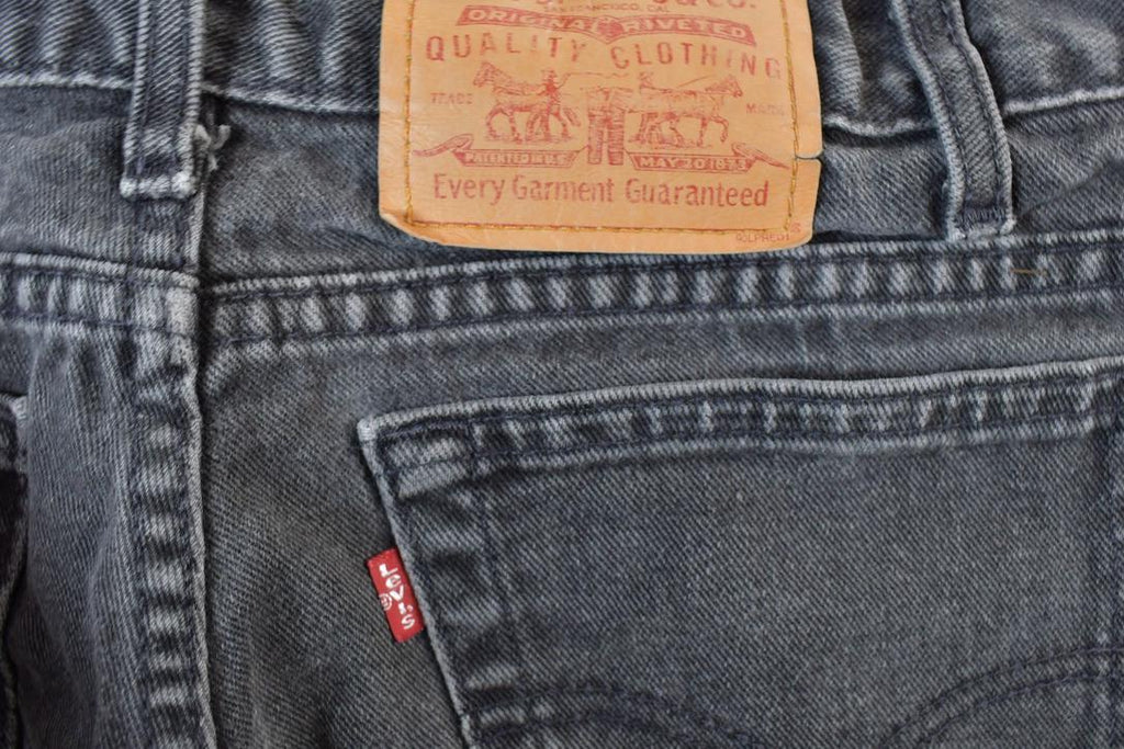 Vintage 1990s Levi Strauss Black Denim Red Tab Jeans Size 32 x 27