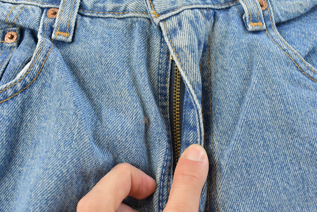 Vintage 1990s Levi's 560 Loose Fit Denim Blue Jeans Size 30 x 32 / 90s Levi's / Distressed Sun Faded Jeans / Made in USA / Streetwear