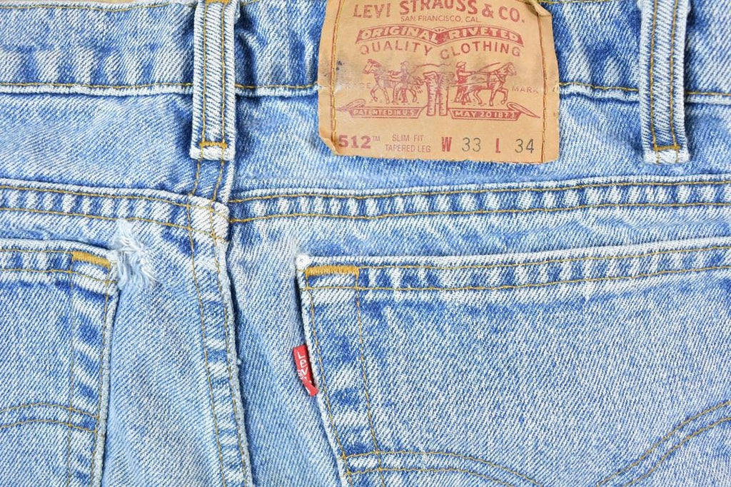 Vintage 1990s Levi Strauss Red Tab 512 Denim Jeans Size 33 x 34 Made In USA