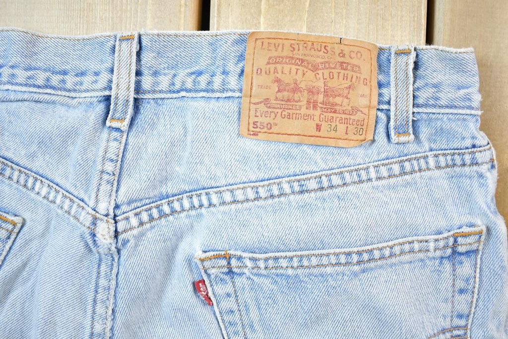 Vintage 1990s Levi Strauss Red Tab 550 Denim Jeans Size 34 x 30 Made In USA