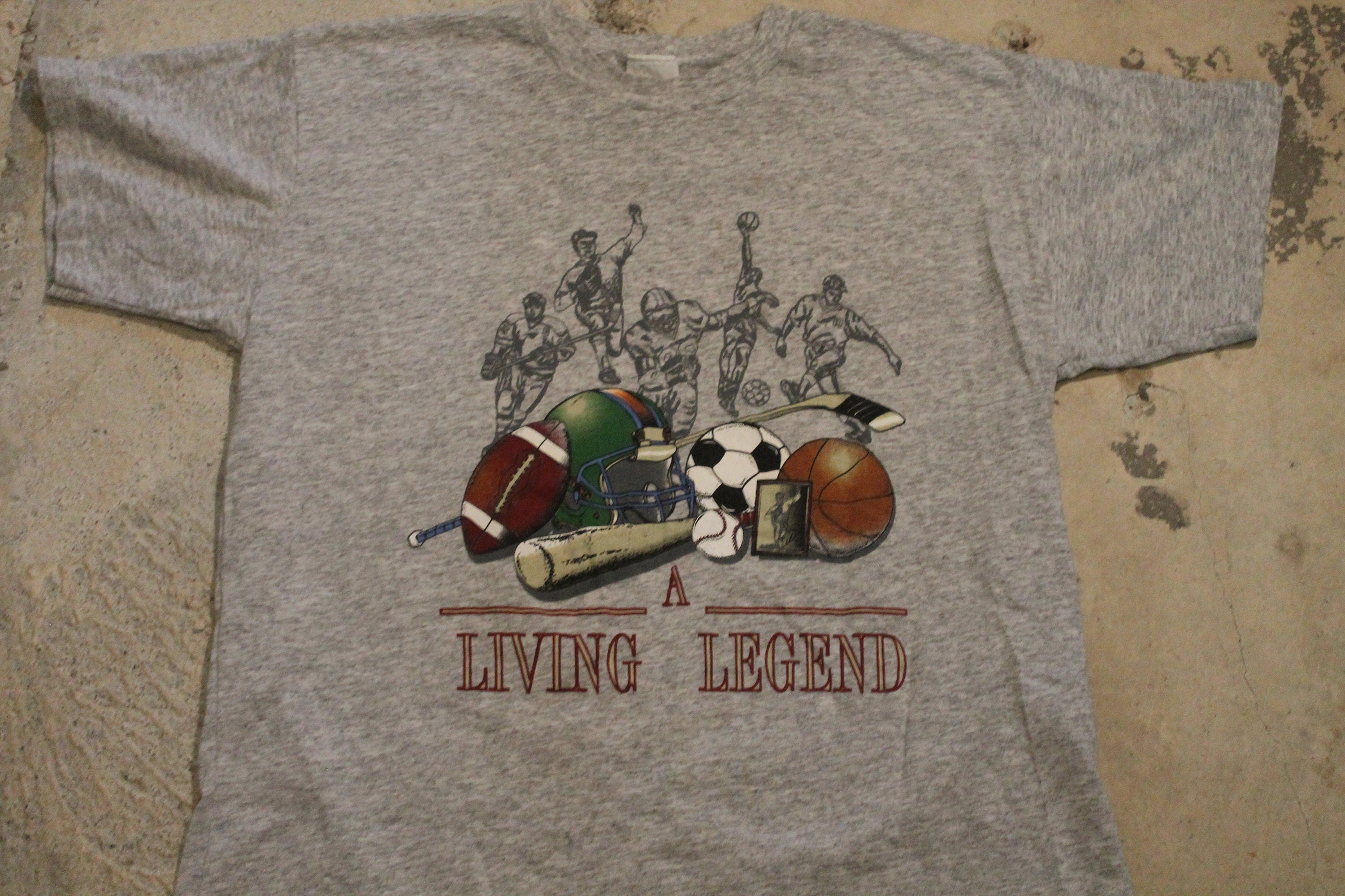 Vintage 1990s T-Shirt A Living Legend Sportswear Graphic T Shirt  80s  90s  Streetwear Fashion  American Football  Avon