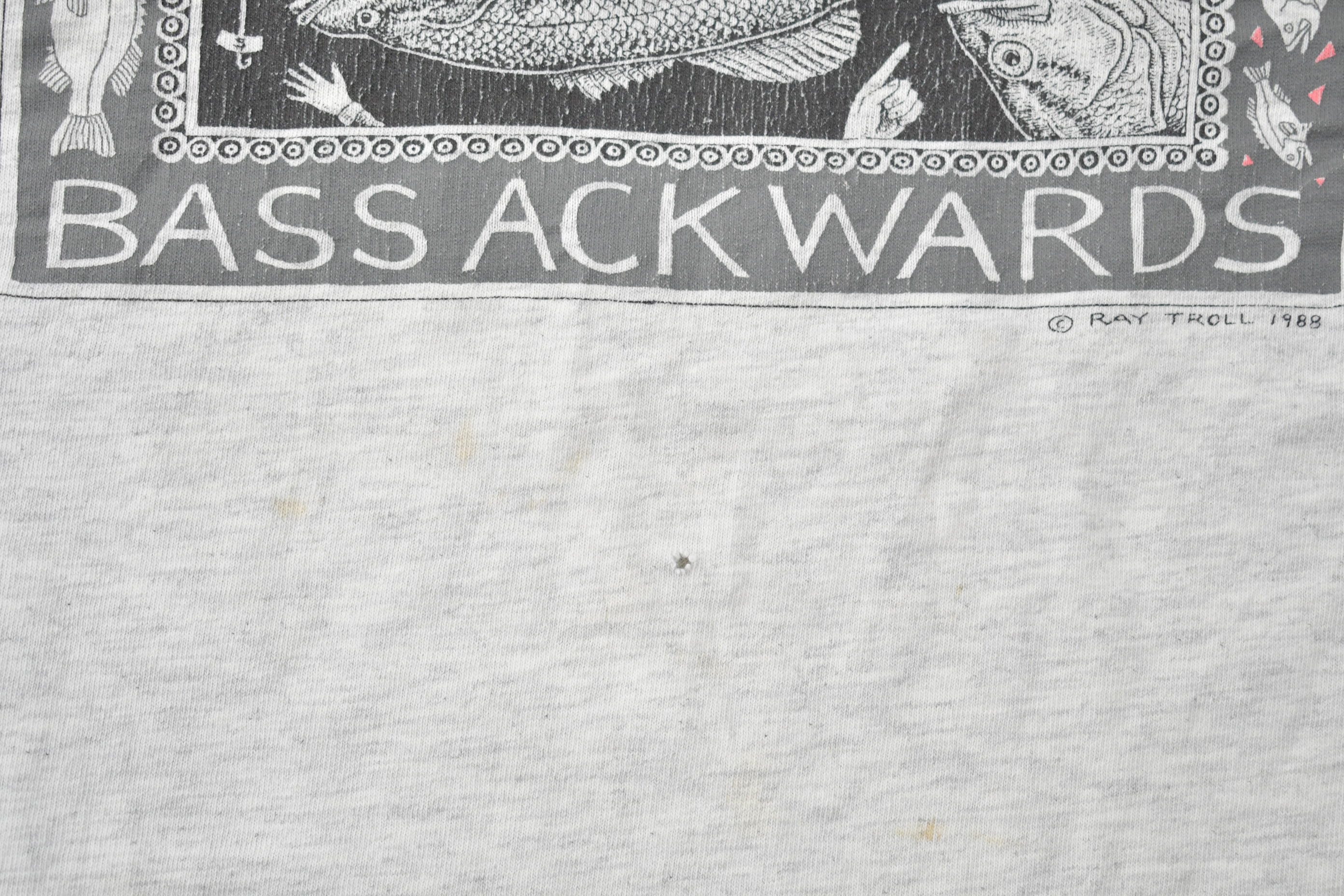 Vintage 1988 Bass Ackwards Fish Ray Troll Graphic T-Shirt