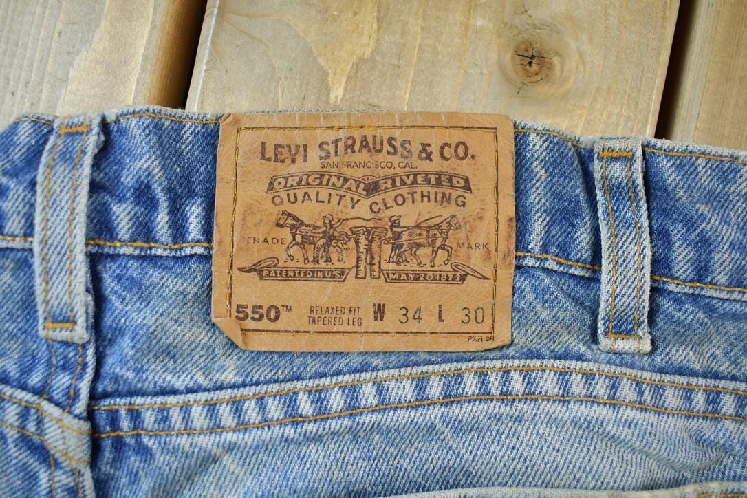 Vintage 1990s Orange Tab 550 Levis Denim Jeans Size 31 x 29