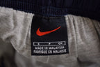 Vintage 1990s Nike Mini Swoosh Track Pants Size S