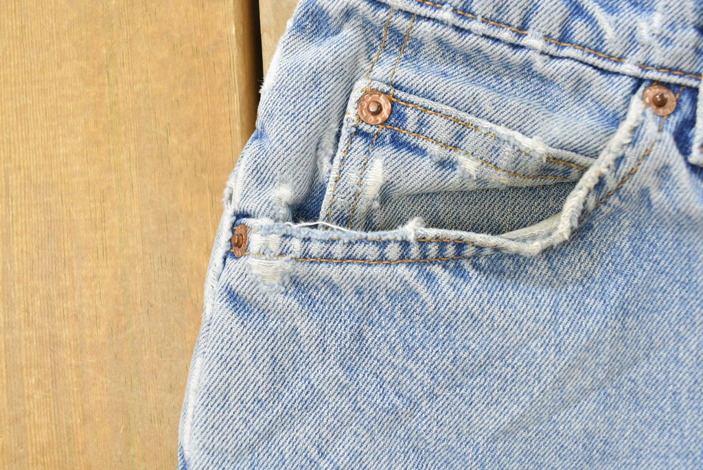 Vintage 1990s Levi's 560 Loose Tapered Denim Jeans Men's 26 x 31 / 90s Levi's / Distressed Sun Faded Jeans