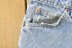 Vintage 1990s Levi's 560 Loose Tapered Denim Jeans Men's 26 x 31 / 90s Levi's / Distressed Sun Faded Jeans