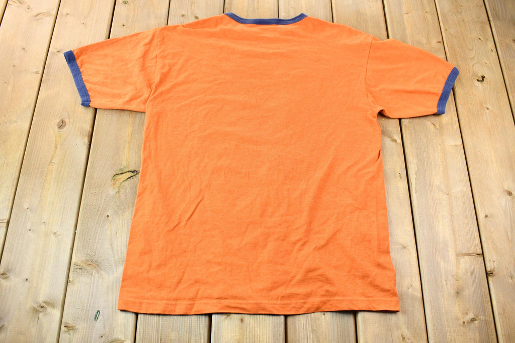 Vintage 2005 Dracula Night of the Vampire Orange and Blue Ringer Graphic T-Shirt