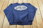 Vintage 1990s Loras College Collegiate Crewneck Sweatshirt Men's L / 90s Fruit of the Loom / NCAA Sweatshirt / Sports / Made In USA