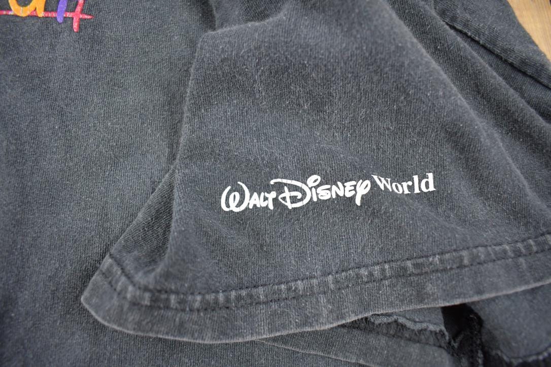 Vintage 1990s I Am Never Growing Up Disney World Graphic T-Shirt