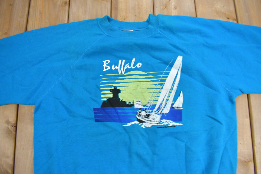 Vintage 1980s Buffalo Sailing Graphic Raglan Crewneck Sweatshirt