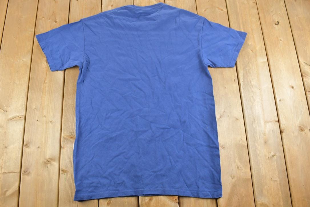 Vintage 1990s The Mountain Mines Bigger Bonfire Theme Graphic T-Shirt