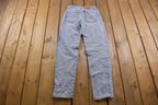 Vintage 1990s Levi's 550 Red Tab Distressed Jeans Size 26 x 32