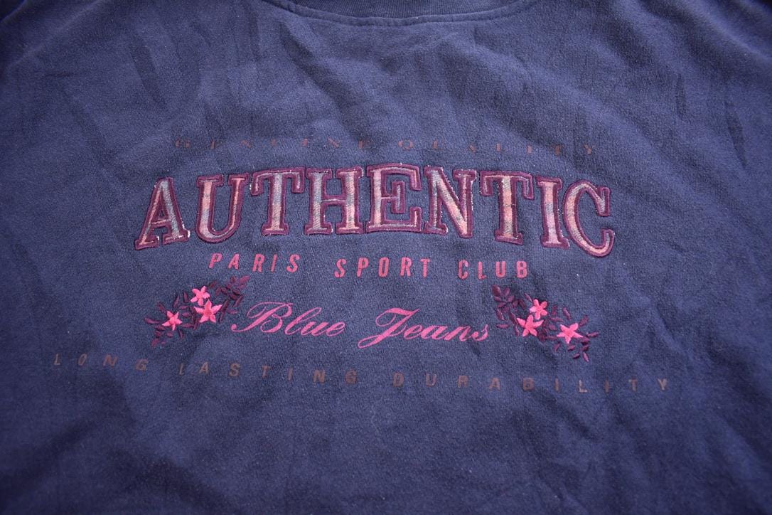 Vintage 1990s Paris Sport Club Authentic Blue Jeans Embroidered Crewneck Sweatshirt Made In USA