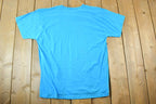 Vintage 1980s Deadstock Penmans Babcock and Wilcox Soccer Souvenir Single Stitch Graphic Print T-Shirt Made In USA