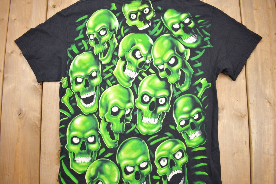 Vintage 2001 Liquid Blue Skull Pile All Over Print T-shirt