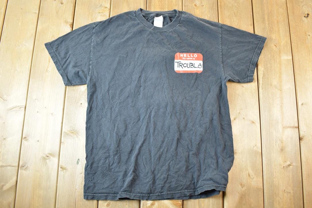 Vintage 1990s Hello My Name Is Trouble Souvenir T-Shirt Men's L