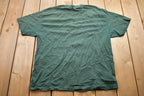 Vintage 1990s Don't Stick Your Head Out Moving Cars T-Shirt