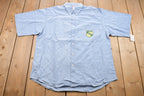 Vintage 1990s Embroidered Green Bay Packers NFL Denim Button Up T-Shirt