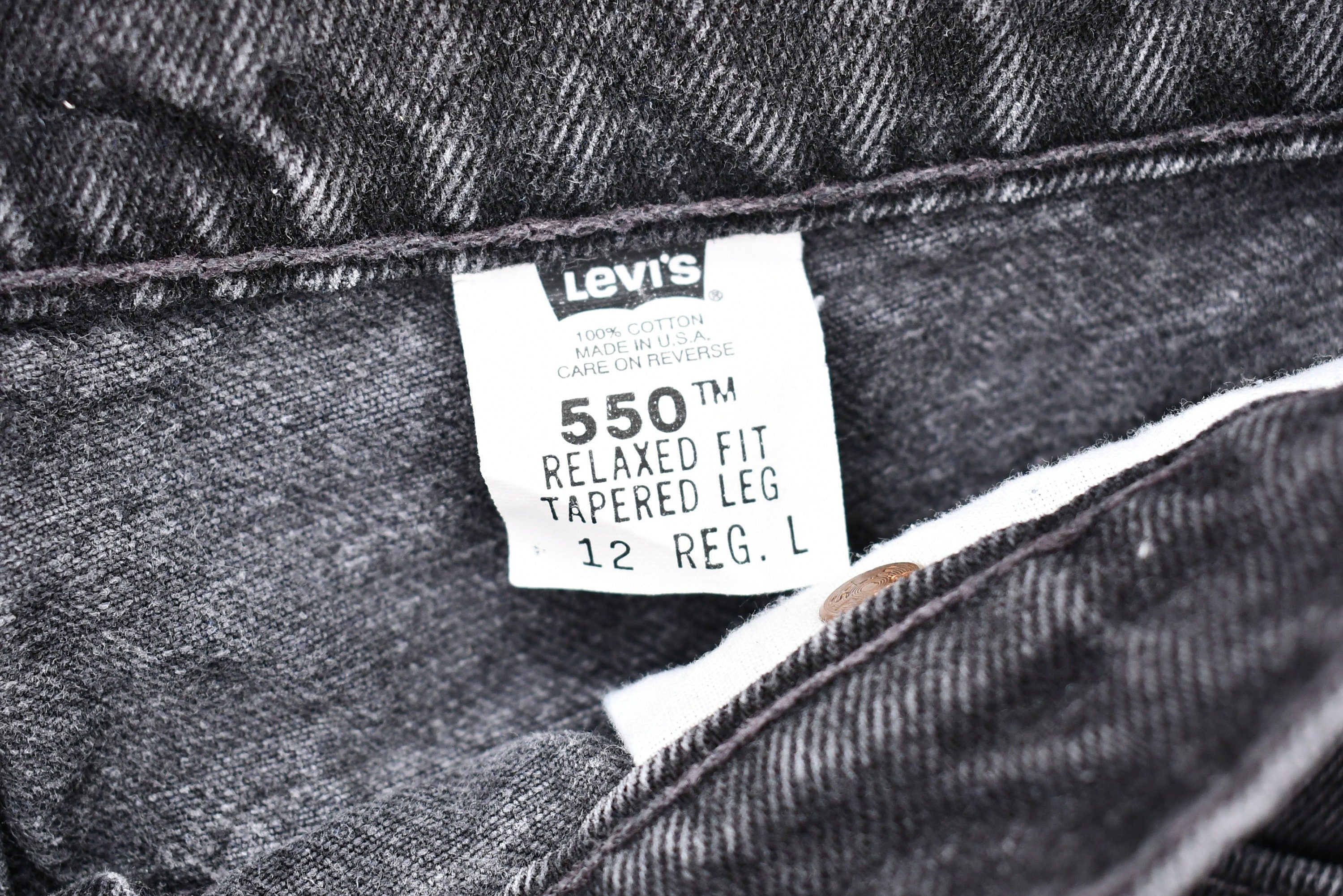 Vintage Early 1990s Levi's 550 Relaxed Tapered Faded Black Jeans