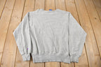 Vintage 1990s Champion Small Logo Embroidered Crewneck Sweatshirt Size M