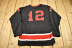 Vintage 1970s Holiday Hockey Clinic Jersey