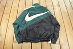 Vintage 1990s Nike Mini Swoosh Windbreaker Jacket Men's Medium