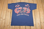 Vintage 1990s Stars And Stripes Wrap Around Patriotic American Flag Print T Shirts