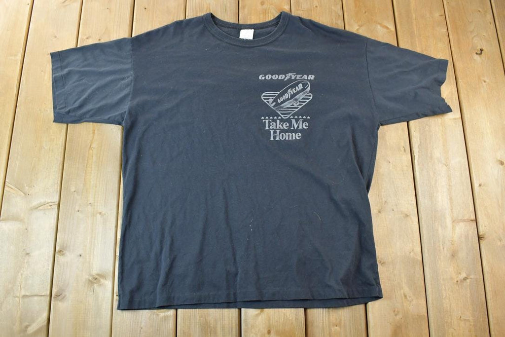 Vintage 1990s Goodyear Souvenir Take Me Home T-Shirt
