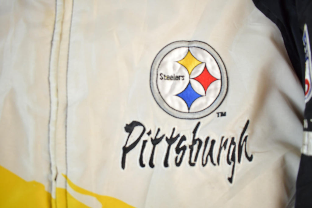 Vintage 1990s Pittsburgh Steelers NFL Pro Line Logo Athletic Paint Splash Puffer Jacket