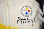 Vintage 1990s Pittsburgh Steelers NFL Pro Line Logo Athletic Paint Splash Puffer Jacket