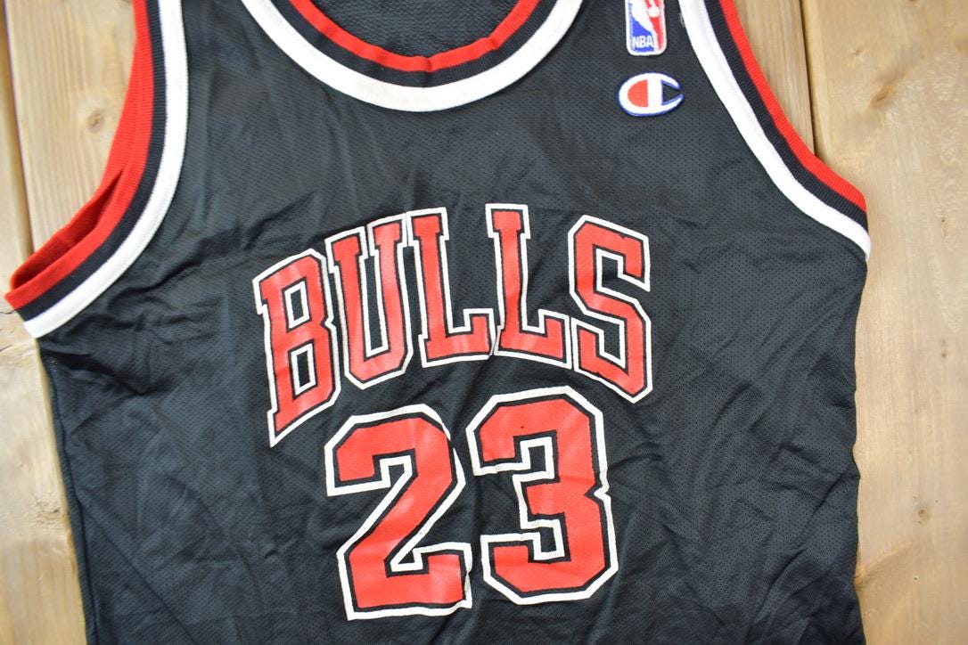Vintage 1990s Michael Jordan Chicago Bulls NBA Champion Youth Sized Jersey