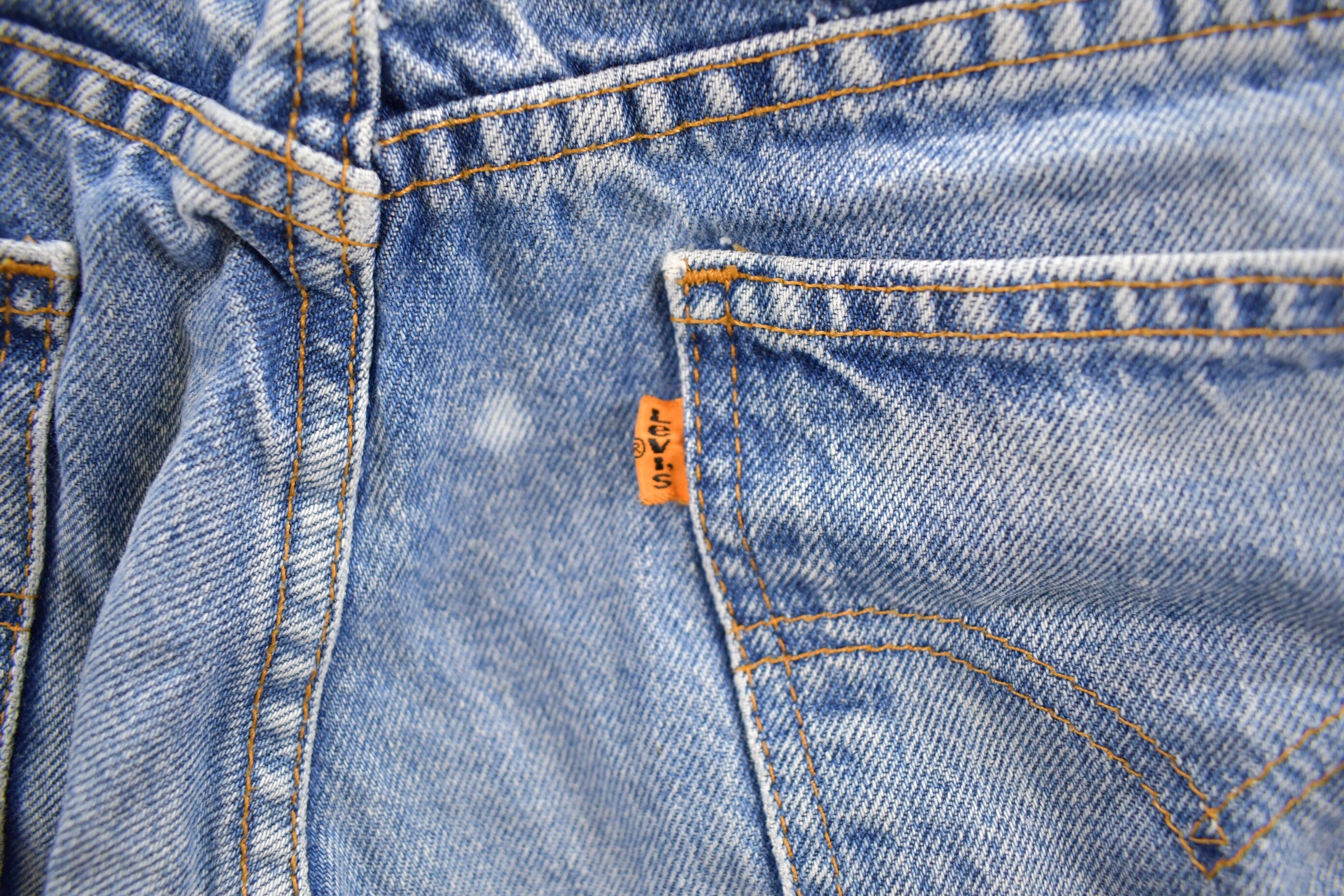 Vintage 1990s Levi's 550 Orange Tab Jeans Size 32 x 30