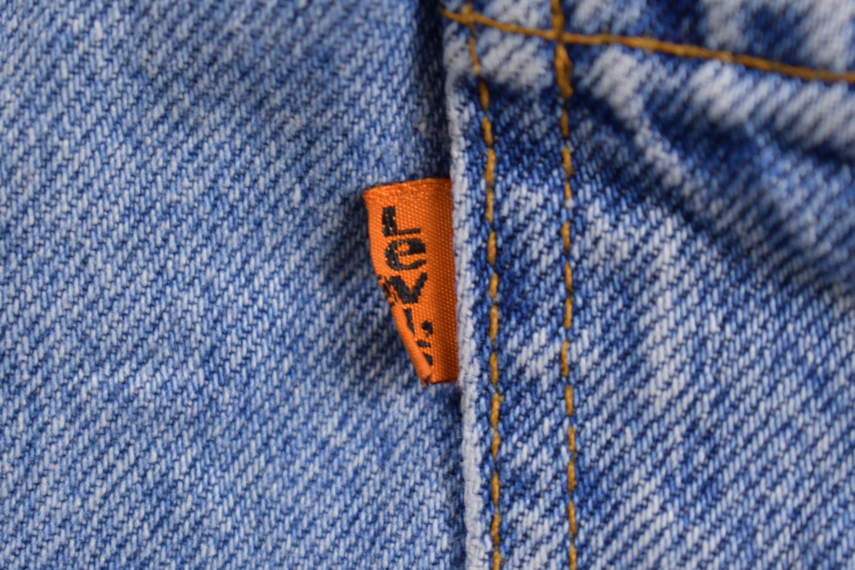Vintage 1990s Levi's 550 Orange Tab Denim Shorts Size 31 x 6.5