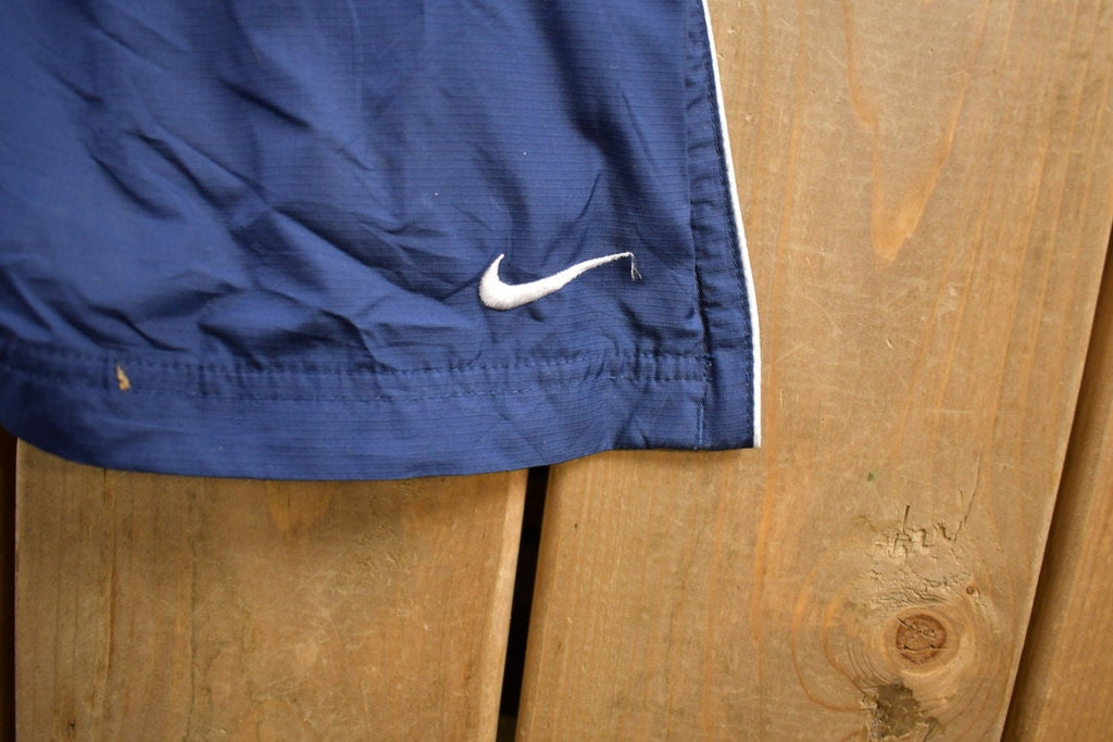 Vintage 1990s Nike Mini Swoosh Track Pants Size S