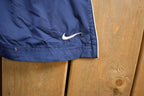 Vintage 1990s Nike Mini Swoosh Track Pants Size S